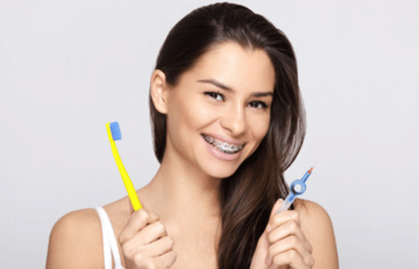 brushing teeth with braces